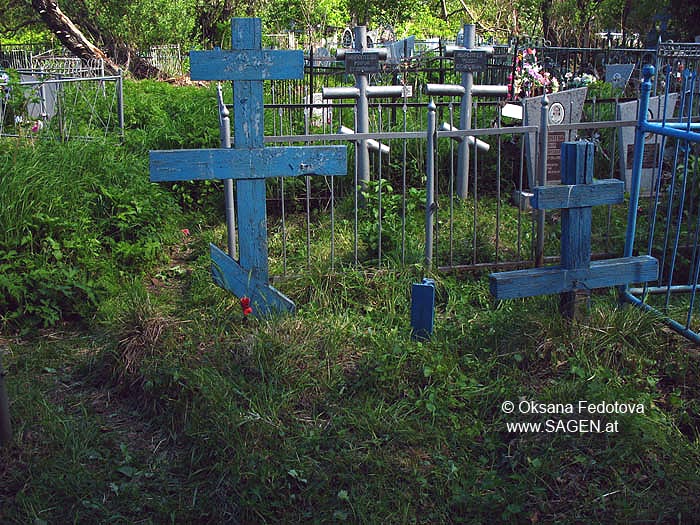 Holzkreuze auf dem Dorffriedhof, Wosnesenje, Archangelsk, Russland © Oksana Fedotova, www.sagen.at